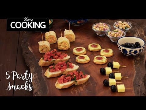 Assorted Party Finger Foods (Olive & Cheese Skewers, Spicy Peanut Cups, Veggie Bread Rolls, Cucumber Cheese Canapés, Tomato Bruschetta)